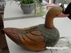 Te koop een grote houten eend, Ophalen