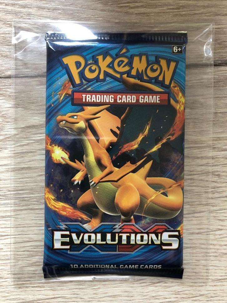 XY Evolutions booster pack Pokemon - Charizard art - sealed!, Hobby en Vrije tijd, Verzamelkaartspellen | Pokémon, Nieuw, Booster