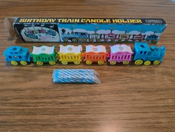 Decoratieve verjaardagstrein met kaarsjes beschikbaar voor biedingen