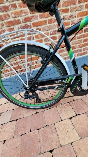 Jongens fiets kleuren zijn wit,groen,zwart  merk District. beschikbaar voor biedingen