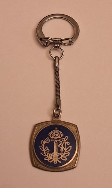 Ancien porte-clés de police., Enlèvement