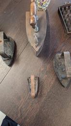 Heel oude strijkijzers, Ophalen