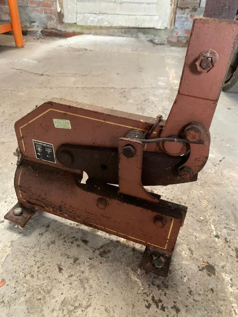 metaalknipschaar, Enlèvement