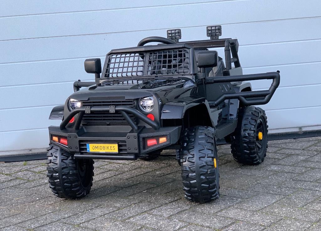 JEEP Mountain King 12v Zwart FM radio, leder, Rubberbanden, Kinderen en Baby's, Speelgoed | Buiten | Accuvoertuigen, Nieuw, Ophalen of Verzenden