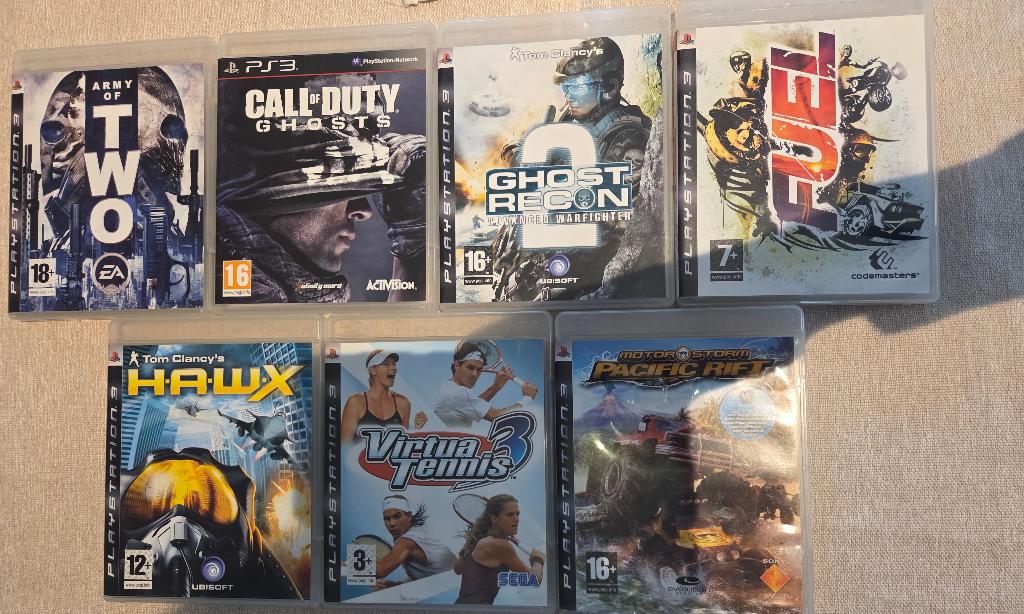7 PS3 games, Enlèvement, Comme neuf