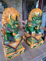 Grote chinese tempelleeuwen, Ophalen