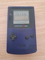 Game boy color met Tetris-spel. Doe het perfect