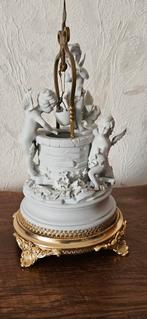 Beeld 3 engeltjes aan een regenput., Enlèvement, Image