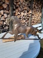 Koperen paard, Ophalen