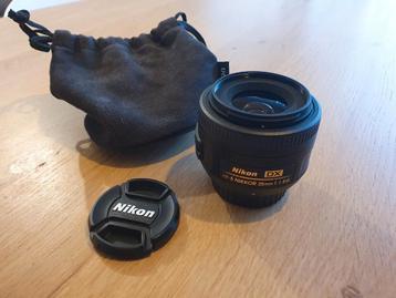 Nikon DX, AFS Nikkor 35mm 1:1.8G, met hoesje