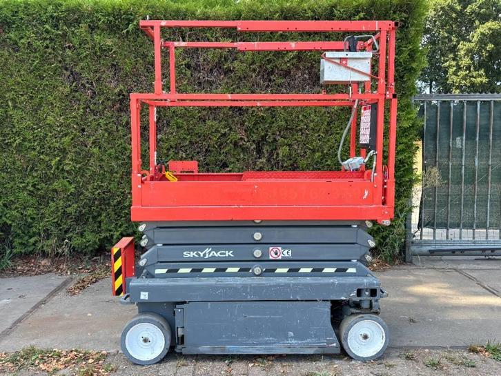 Skyjack SJ3219 schaarhoogwerker 8m hoogwerker schaarlift, Zakelijke goederen, Machines en Bouw | Liften, Steigers en Ladders