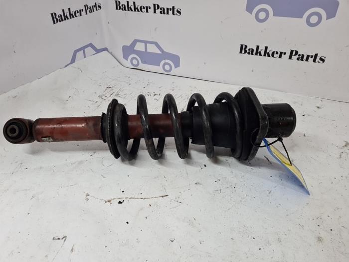 Schokdemperpoot links-achter van een Audi A6, Auto-onderdelen, Ophanging en Onderstel, Audi, Gebruikt, 3 maanden garantie