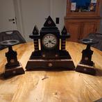 Schouwgarnituur, Ophalen