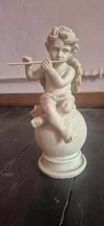 Beeldje van een fluitende engel, Ophalen