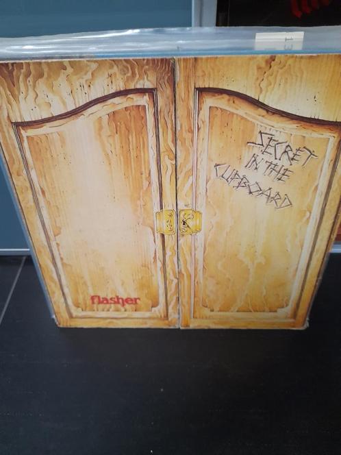 lp - flasher - secret in the cupboard - red vinyl, Cd's en Dvd's, Vinyl | Rock, Gebruikt, Overige genres, 12 inch, Ophalen of Verzenden