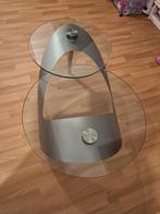 Table bas en verre, Enlèvement