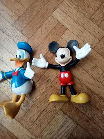 Mickey Mouse en Donald Duck. beschikbaar voor biedingen