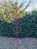 metalen vrouwenbeeld, Ophalen