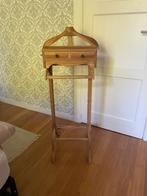 Valet de chambre en teck, Ophalen
