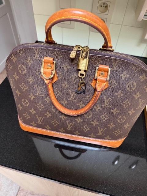 Handtas, Ophalen, Gebruikt