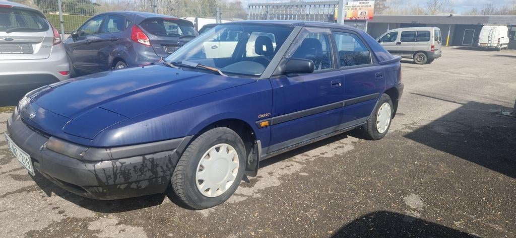 MAZDA 323//1994//52000 KM, Autos, Mazda, Achat, 82 kW, Entreprise, Boîte manuelle