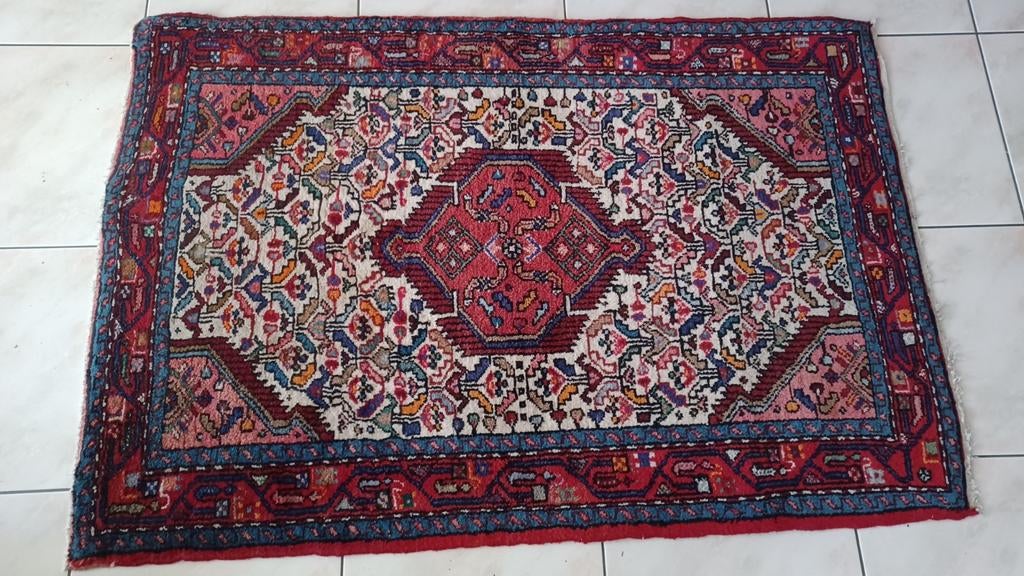 Wollen tapijt., Ophalen