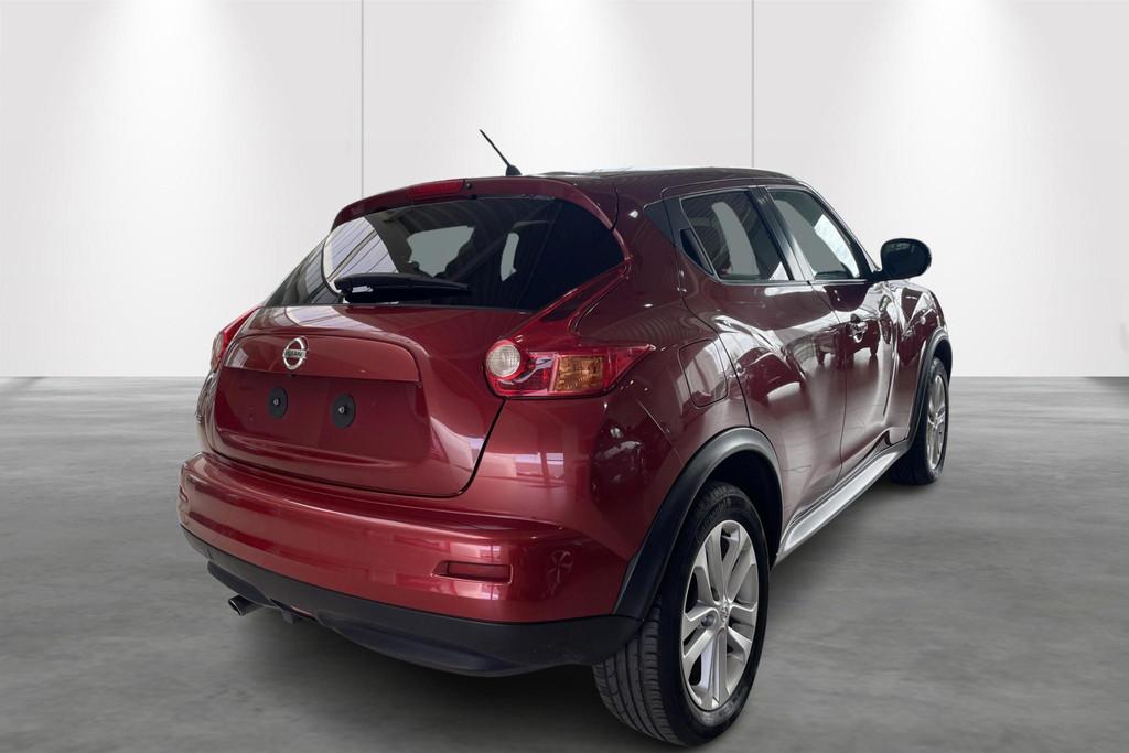 Nissan Juke 1.6 Tekna 4x2 5MT, Autos, Nissan, Rouge, Euro 5, 1250 kg, Boîte manuelle