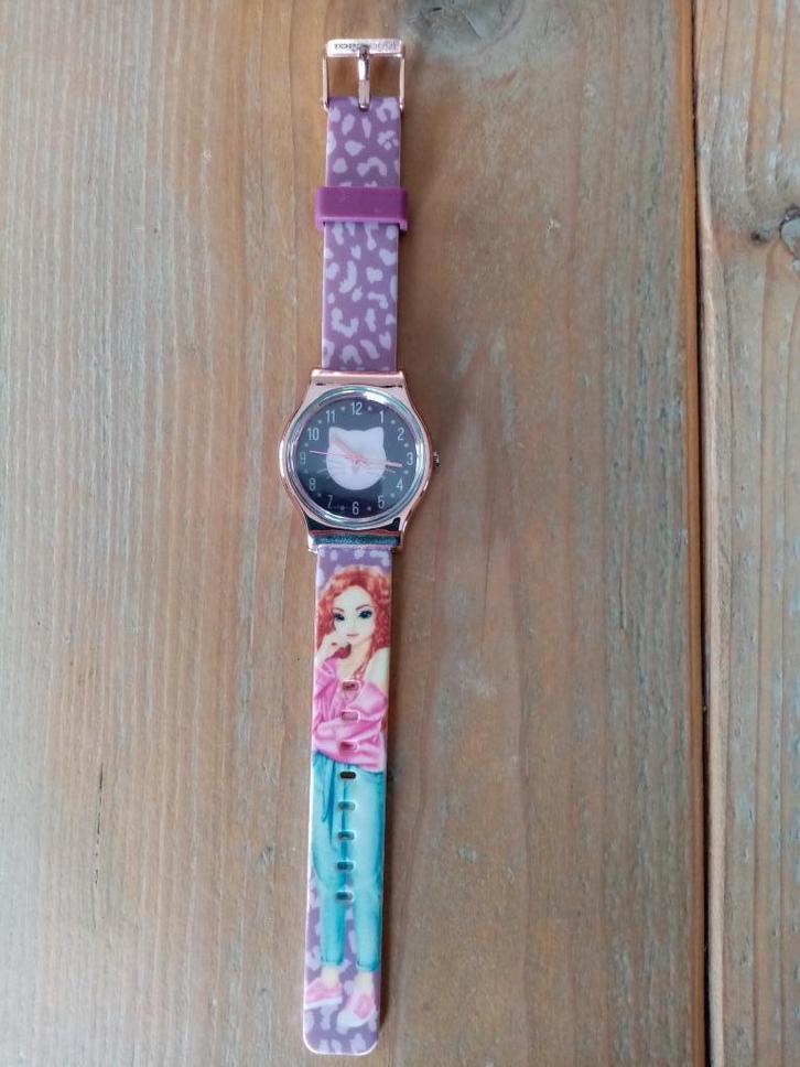 Uurwerk TopModel, Kinderen en Baby's, Kinderspulletjes, Zo goed als nieuw, Ophalen of Verzenden