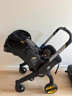 Siège auto Doona + isofix + housse de pluie, Autres marques, Dossier réglable, Enlèvement, Utilisé