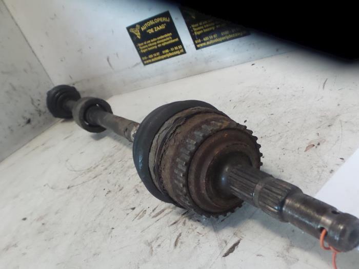 Aandrijfas rechts-voor van een Opel Corsa, Auto-onderdelen, Remmen en Aandrijving, Opel, Gebruikt, 3 maanden garantie, Ophalen of Verzenden