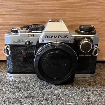 Olympus OM10 analoge camera + lenzen + accessoires beschikbaar voor biedingen
