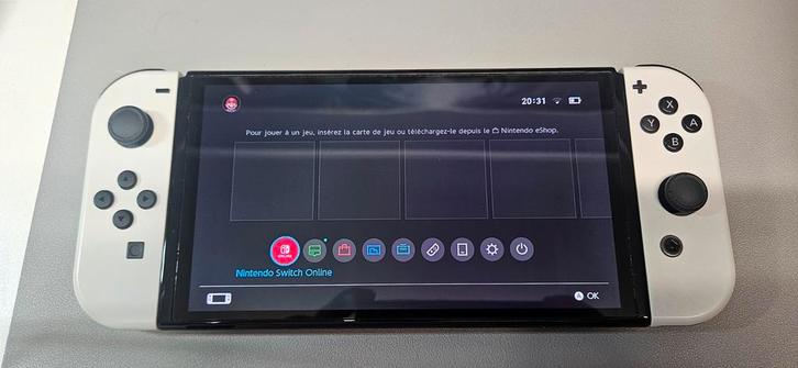 Nintendo Switch OLED-garantie, Games en Spelcomputers, Spelcomputers | Nintendo Switch, Zo goed als nieuw, Switch OLED, Ophalen of Verzenden