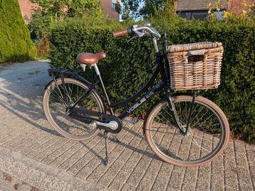 Vogue elite damesfiets met rieten mand.  beschikbaar voor biedingen