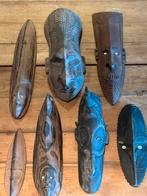 7 houten maskers Papua New Guinea, Ophalen