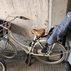 Damesfiets met kinderstoel, Ophalen
