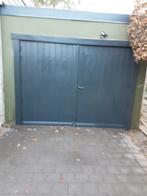 Mirantie houten garage poort geschilderd