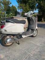 Vespa Lx50 B-klasse (+ 2 helmen), Fietsen en Brommers, Snorfietsen en Snorscooters, Ophalen, Gebruikt, Benzine, Vespa