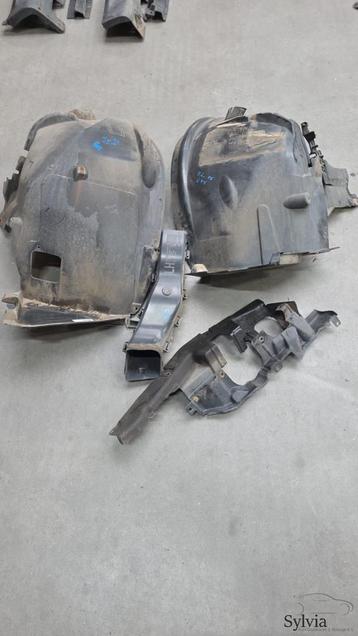 Binnenscherm wielkuip modderkuip voorzijde links set BMW X5  beschikbaar voor biedingen