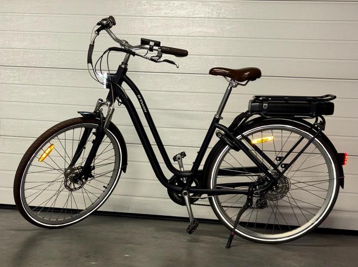 Elektrische B’twin Elops 900e, Fietsen en Brommers, Elektrische fietsen, Zo goed als nieuw, 50 km per accu of meer, Ophalen