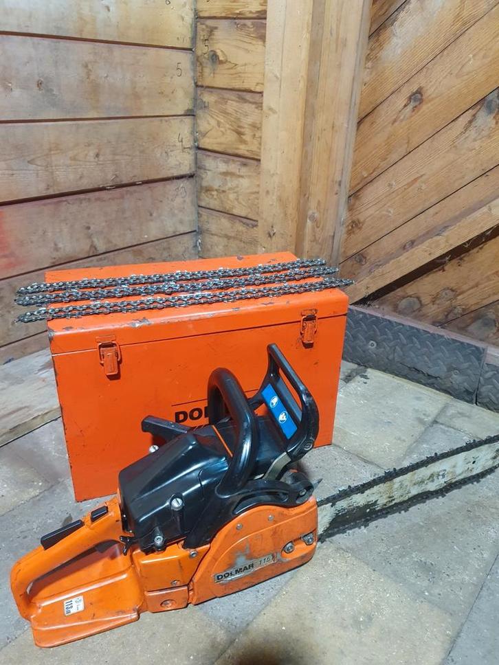 Kettingzaag Dolmar 115i in metalen doos + 3 nieuwe kettingen, Doe-het-zelf en Bouw, Gereedschap | Zaagmachines, Gebruikt, Kettingzaag