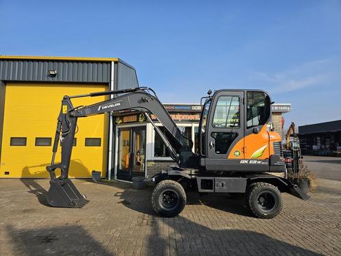 Develon DX60WN ECO-1 WE1255, Zakelijke goederen, Machines en Bouw | Kranen en Graafmachines, Graafmachine