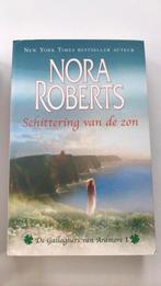 Nora Roberts - Schittering van de zon, Livres, Romans, Comme neuf, Enlèvement, Nora Roberts