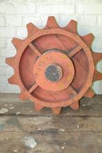 Antiek houten tandwiel, Ophalen