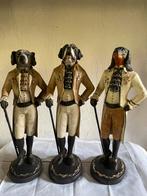 3 beeldjes honden in kostuum, Enlèvement