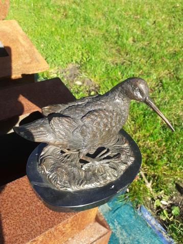 Bronzen beeld op marmeren sokkel (de houtsnip) beschikbaar voor biedingen