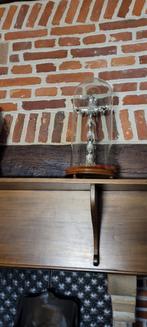 Kruisbeeld onder stolp, Enlèvement, Utilisé