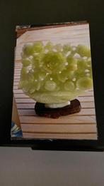 Twee yade beelden te koop, Ophalen