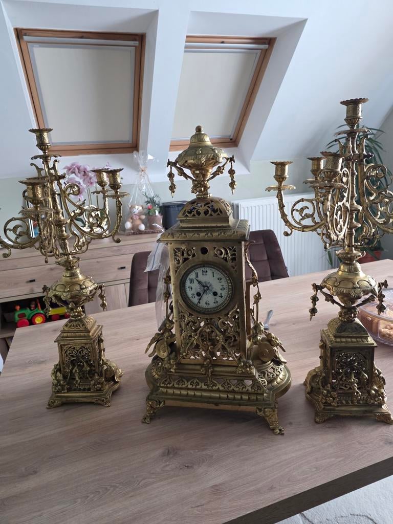 Grotte schouwgarnituur, Ophalen