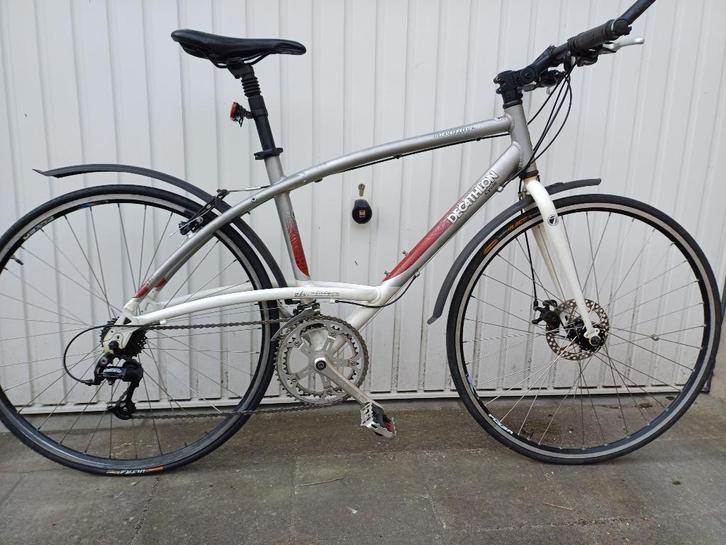 Herenfiets Triban 2x9 road 7 vernieuwd, Fietsen en Brommers, Fietsen | Racefietsen, Zo goed als nieuw, 15 tot 20 versnellingen