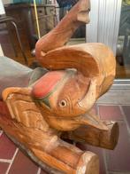 Houten olifant., Ophalen
